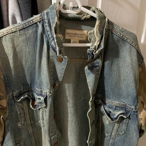 This is a polo Jean jacket vintage style with cuts and rips in it nice jacket